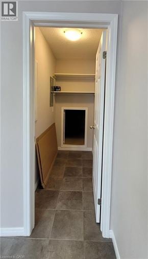 Kitchener townhouse for rent - A hallway with a door at the end.