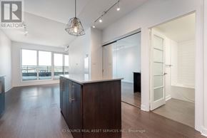 Toronto (Little Portugal) condo for rent - A realtor logo is on the top left of the image.