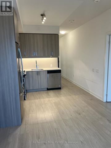 Mississauga (Hurontario) condo for rent - A kitchen with a sink and cabinets is shown in this image.