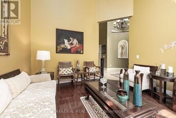 Oakville (Jc Joshua Creek) apartment for rent - A living room with a couch, chairs, and a painting on the wall.