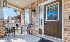 Brampton (Northwest Brampton) apartment for rent - A patio with a table and chairs is shown.