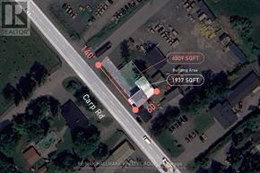 Ottawa apartment for rent - An aerial view of a street with a building and a carport on the right side.