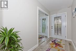 Mississauga (Applewood) apartment for rent - A room with a white door and a plant on the left.