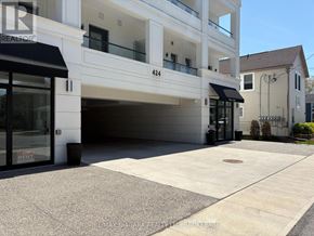 Fort Erie (Ridgeway) condo for rent - A modern building with the number 424 on it.