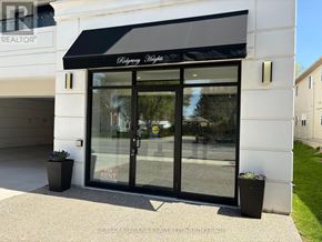 Fort Erie (Ridgeway) condo for rent - A real estate office with a sign that says "For Rent".