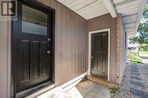 Ottawa apartment for rent - A black door is on the left and a grey door is on the right.