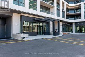 Toronto (Clairlea-Birchmount) condo for rent - A modern building with the sign "REALTOR" on the top left corner.