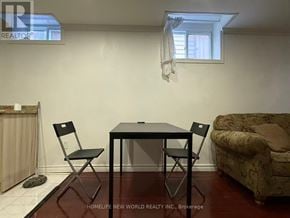 Markham (Middlefield) apartment for rent - A room with a table, chairs and a couch.