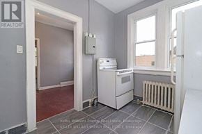 Oshawa (Central) apartment for rent - A room with a Keller Williams Energy logo on the wall.
