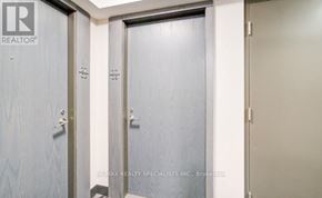 Toronto (Islington-City Centre West) condo for rent - A set of three doors with the middle one being the largest.