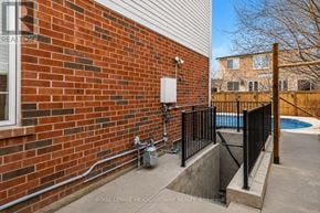 Milton (Be Beaty) apartment for rent - A red brick wall with a pool in the backyard.