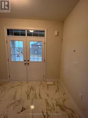 Wellington North (Arthur) apartment for rent - A room with a marble floor and a white door.