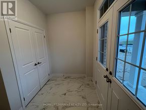 Wellington North (Arthur) apartment for rent - A room with marble flooring and white doors.