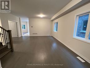 Wellington North (Arthur) apartment for rent - A spacious room with wooden floors and white walls, part of a real estate listing.