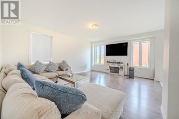 Fort Erie (Crescent Park) apartment for rent - A living room with a couch and a television.