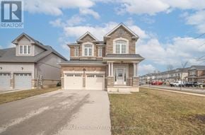 Fort Erie (Crescent Park) apartment for rent - A large, two-story house with a garage is for sale.