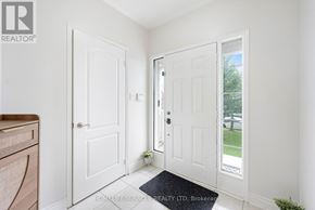 Oshawa (Taunton) townhouse for rent - A white door with a glass window is open.