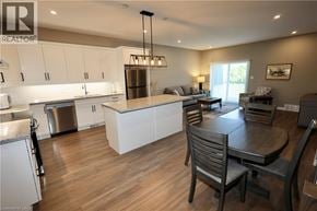Seaforth townhouse for rent - A modern kitchen with a dining table and chairs.