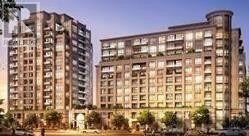 Markham (Unionville) condo for rent - Two modern apartment buildings are shown at dusk.