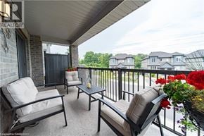 Kitchener townhouse for rent - A balcony with two chairs and a table.