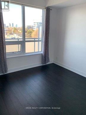Toronto (Bayview Village) condo for rent - A room with a large window and a view of the city.