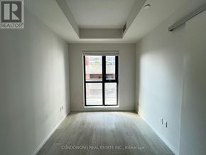 Toronto (Church-Yonge Corridor) condo for rent - A room with a window and wooden flooring.