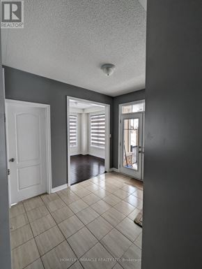 Collingwood apartment for rent - A room with a white door and a window with blinds.