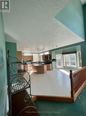 Guelph (Pineridge/Westminster Woods) apartment for rent - A large open room with a spiral staircase.