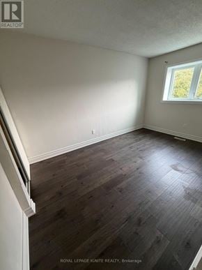 Toronto (Agincourt North) townhouse for rent - A room with wooden flooring and a window letting in light.