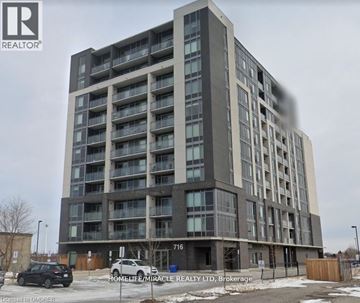 Milton (Tm Timberlea) condo for rent - A tall building with the number 716 on it.