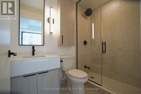 Toronto (Forest Hill South) condo for rent - A bathroom with a toilet, sink, and shower.