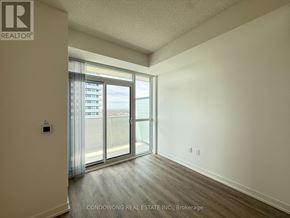 Vaughan (Vaughan Corporate Centre) condo for rent - A room with a sliding glass door leading to a balcony.