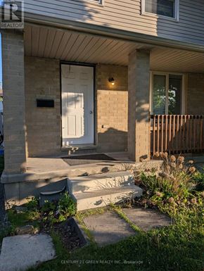London South (South X) apartment for rent - A house with a white door and a small porch.