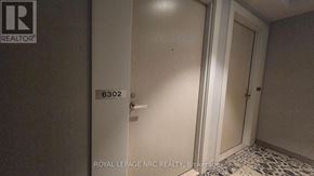 Toronto (Waterfront Communities) condo for rent - A white door with the number 6302 on it.