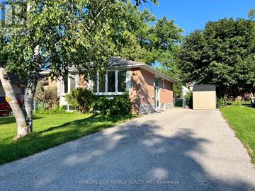Aurora (Aurora Heights) apartment for rent - A house with a driveway in front of it.