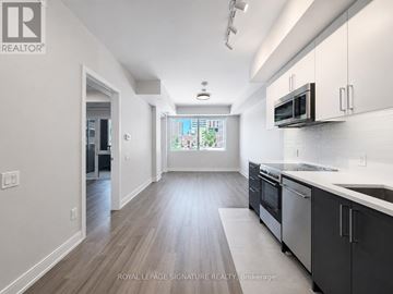 Toronto (University) condo for rent - A kitchen with a microwave above the stove.