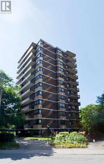 Toronto (Church-Yonge Corridor) condo for rent - A tall residential building with balconies on the upper floors.