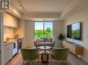 Toronto (High Park North) condo for rent - A well-lit, modern kitchen and living room with a view of the outdoors.