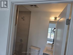 Toronto (Clairlea-Birchmount) condo for rent - A bathroom with a toilet, sink and shower.