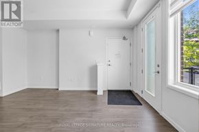 Pickering (Duffin Heights) townhouse for rent - A white room with a door and a window.