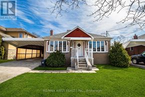 Toronto (Yorkdale-Glen Park) apartment for rent - A house with a red roof and a white door is for sale.