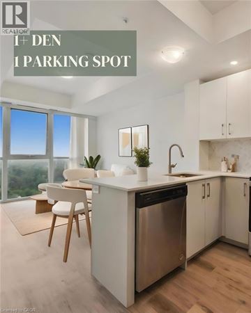 Kitchener condo for rent - A modern kitchen with a dishwasher, sink, and a window overlooking the outdoors.