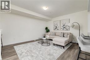 Cambridge townhouse for rent - A living room with a couch, a small table, and a rug.