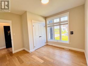 Southwold (Talbotville) apartment for rent - A room with a door and a window.