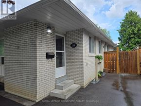 Mississauga (Clarkson) apartment for rent - A house with the number 201 on the front door.