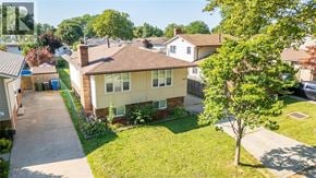 Windsor apartment for rent - A house with a tree in front of it.