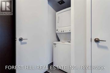 Toronto (Mount Pleasant West) condo for rent - A small white kitchen with a dishwasher and oven.
