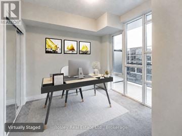 Grimsby (Grimsby Beach) condo for rent - A virtually staged living room with a table and chairs.