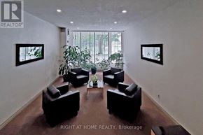 Toronto (Tam O'shanter-Sullivan) condo for rent - A living room with a couch, chairs, and a coffee table.