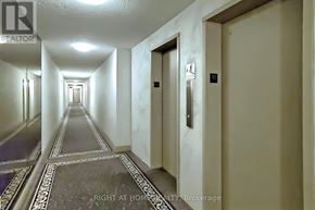 Toronto (Tam O'shanter-Sullivan) condo for rent - A long hallway with doors on both sides.